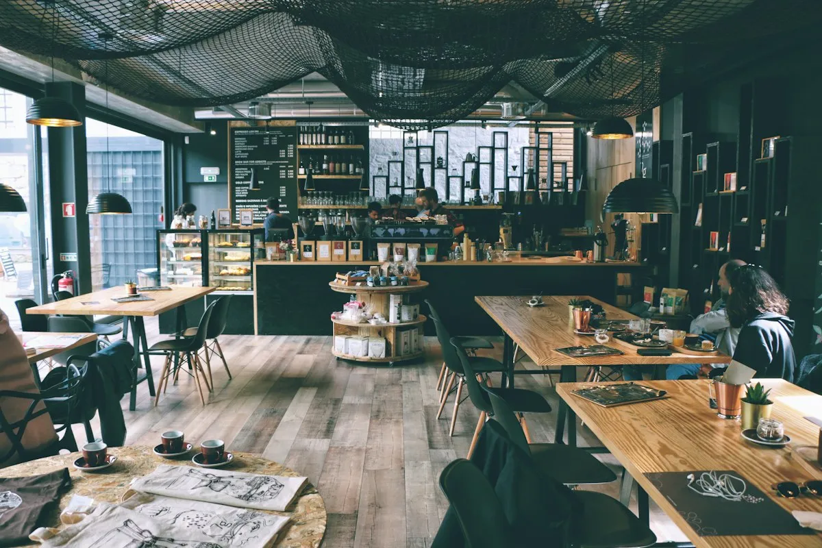 Baristas at work behind the Purr and Pour coffee bar